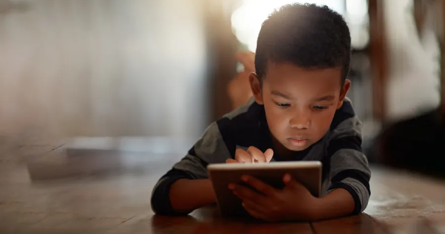 a boy with tablet