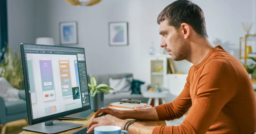 Man working on a laptop.